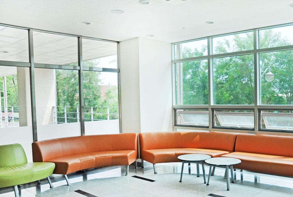 Sofas and tables in the Sunglim Hall common lounge